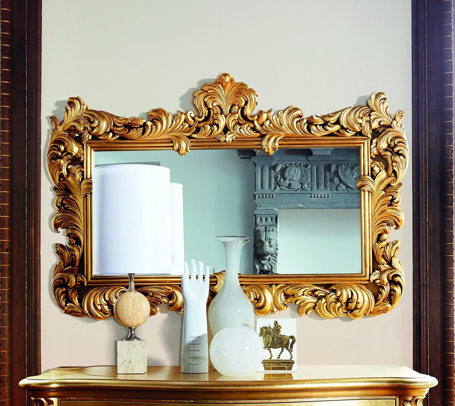 Ornate gold Italian mirror displayed above a dresser at Michelangelo Designs